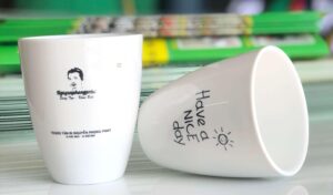 Ly sứ in logo quà tặng An Khê